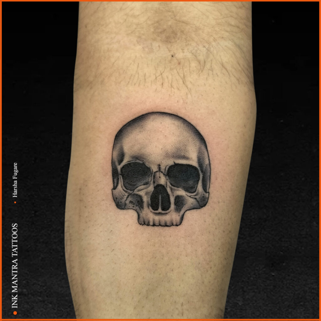 Skull tattoo by Ink Mantra Tattoos