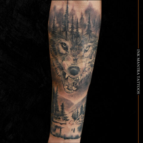 Wolf Tattoo With Forest And Mountain Done By Ink Mantra Tattoos