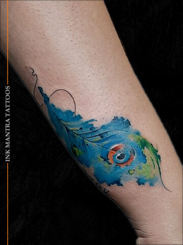 Water Color Style Peacock Feather Tattoo By Ink Mantra Tattoo - Ink Mantra Tattoo Studio